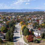 panoramic photo of city of castle pines in the fall when the leaves are change